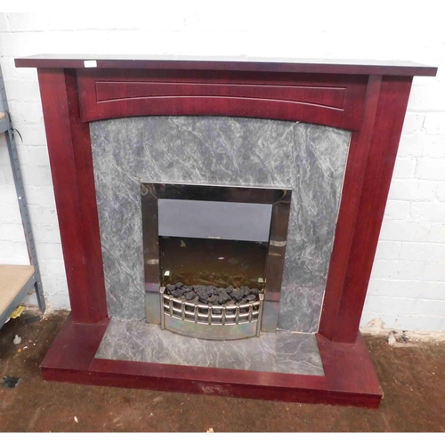 531 - Electric fire and fireplace surround