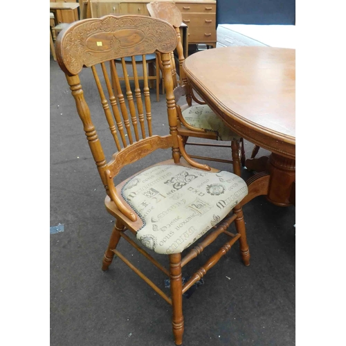 550 - Oval extending dining table & 4 carved chairs