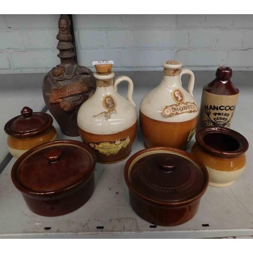 572 - Collection of alcohol jugs including Bronte & Calvados