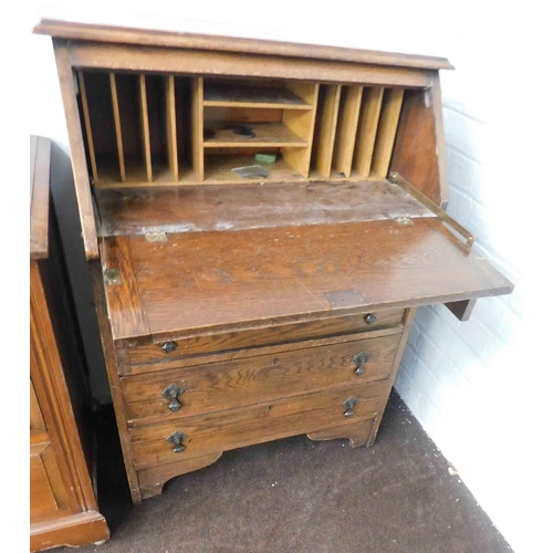 652 - Vintage drop fronted oak writing desk