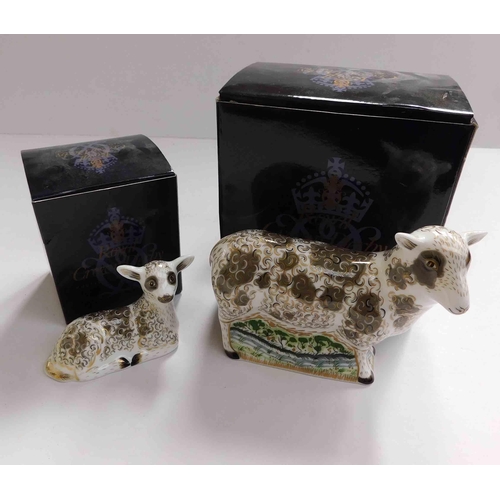 208 - Two - Royal Crown Derby paperweights - Jacob Lamb & Sheep with gold stoppers - no damage boxed