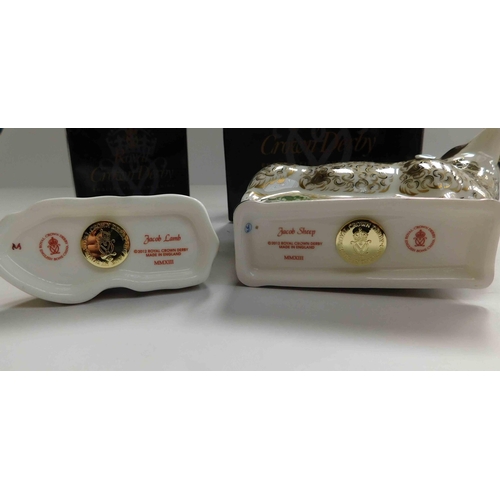208 - Two - Royal Crown Derby paperweights - Jacob Lamb & Sheep with gold stoppers - no damage boxed