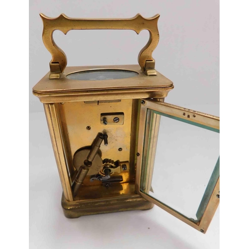 209 - French antique carriage clock -  brass casing, enamelled dial & bevelled glass W/O - slight crack to... 