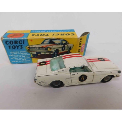 104 - Vintage 1960s - Corgi toys no. 325 Ford Mustang - in original box