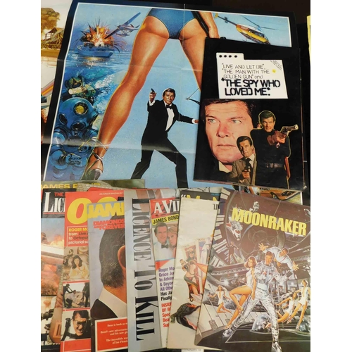 24 - James Bond magazines, posters & scrap book...