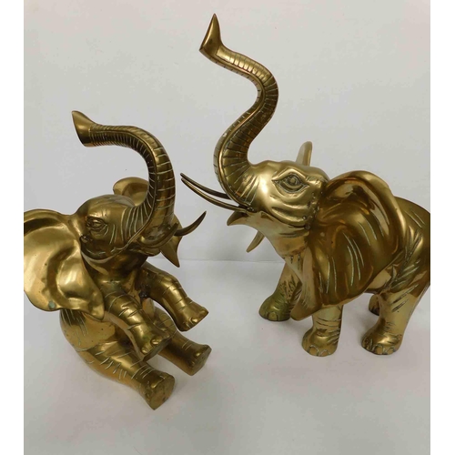 27 - Pair of large - solid brass elephants longest approximately 16in length