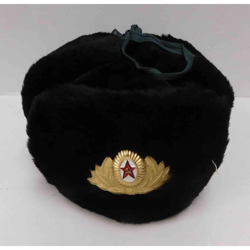 28 - Russian trapper hat with Soviet badge...