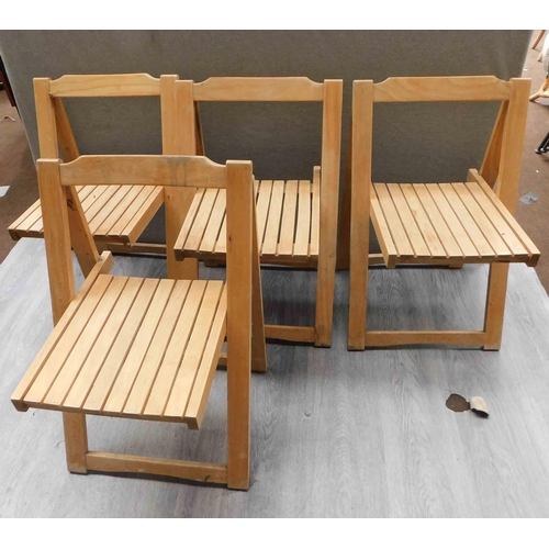 550 - Four folding chairs