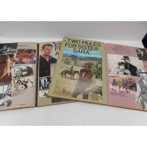 693 - 2x Clint Eastwood collectors scrapbooks