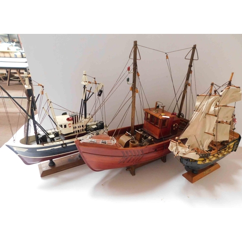 26 - Three - models of fishing boats...