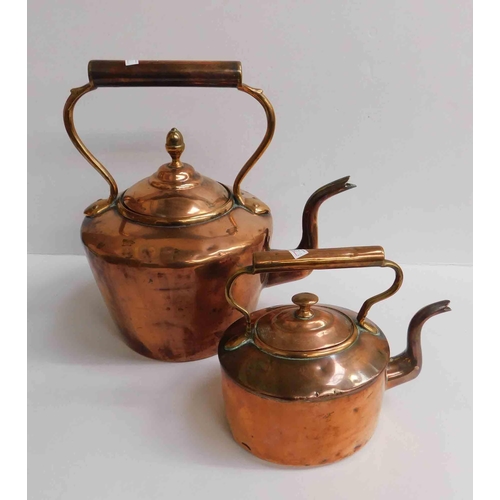 28 - Two - copper kettles...