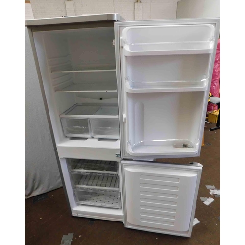 531 - Indesit silver fridge freezer, approx. 62