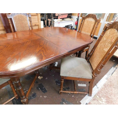 747 - Extending large table with 4x rattan backed chairs