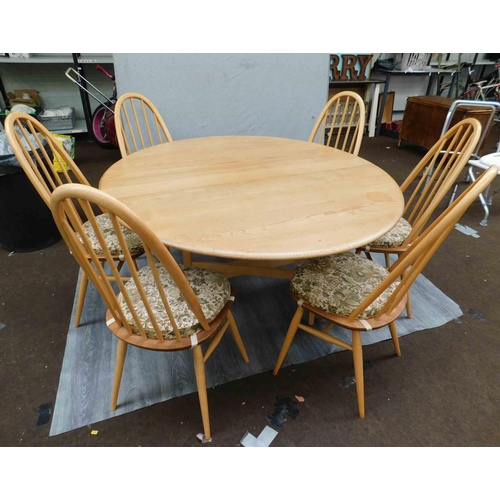 768 - Circular Ercol drop leaf table and 6x chairs
