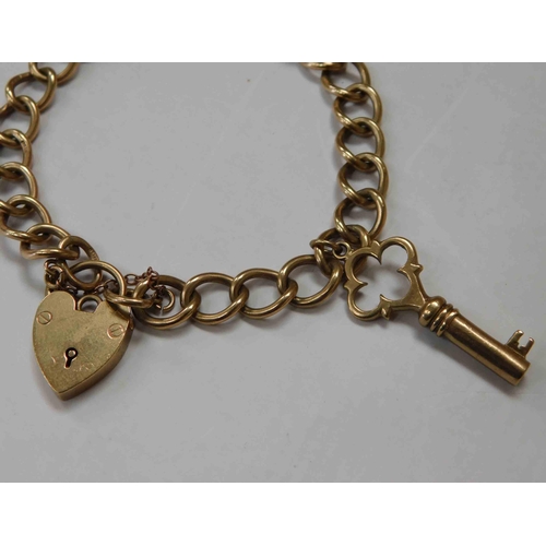 138 - 9ct Gold - charm bracelet approx weight 20.8g