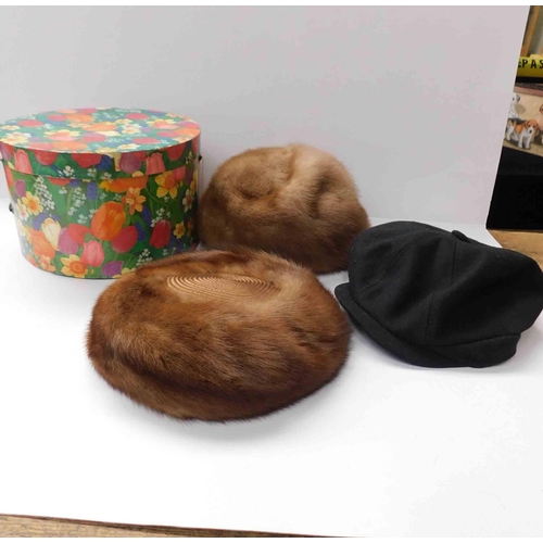 44 - Hat box - two fur hats & cap