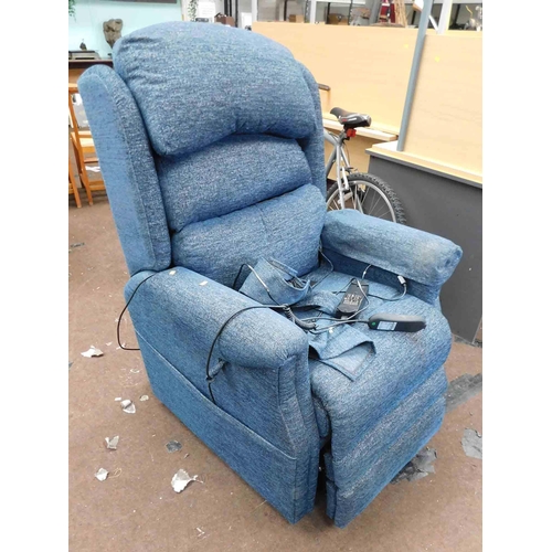 556 - Rise & recline navy armchair w/o