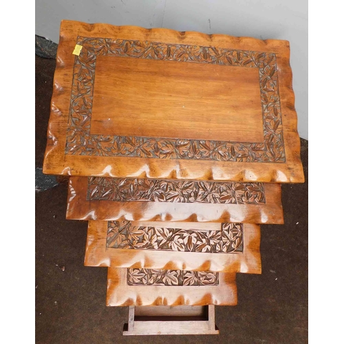 737 - Nest of 4 ornate carved tables