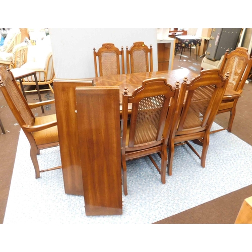 782 - Inlaid extending table with 2 extra leaves, 4x chairs and 2 carvers, rattan backed