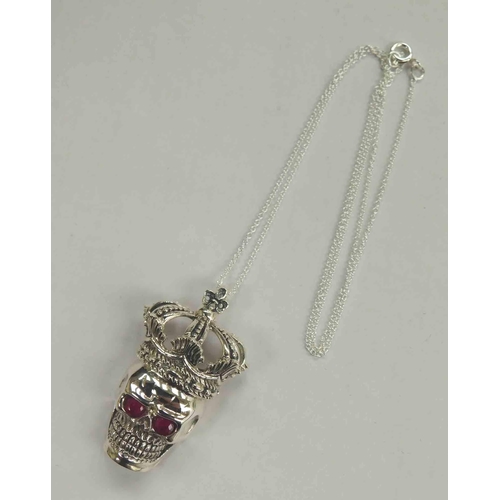 151 - Silver - stone set skull pendant on silver chain