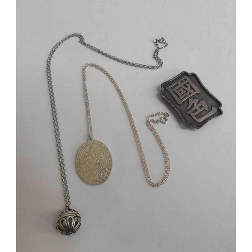 201 - Two - Sterling silver necklaces & pendants - Jubilee pendant & hallmarked Oriental belt buckle