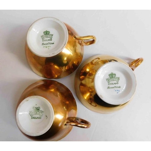 208 - Aynsley - J.A Bailey signed gold cups & saucers