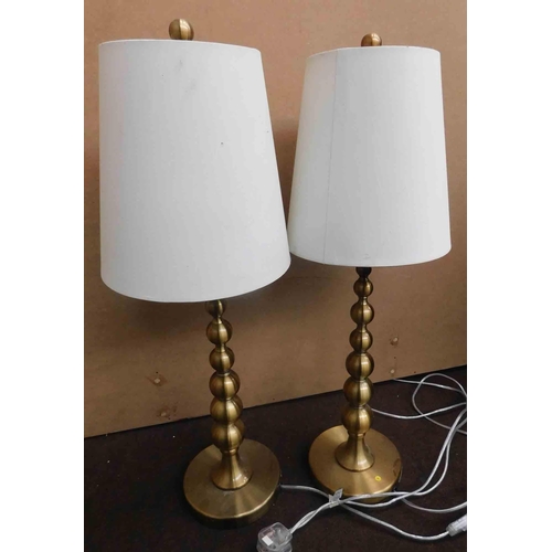 42 - Pair of brass lamps - H 28