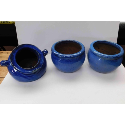 519 - Three blue glazed plant pots