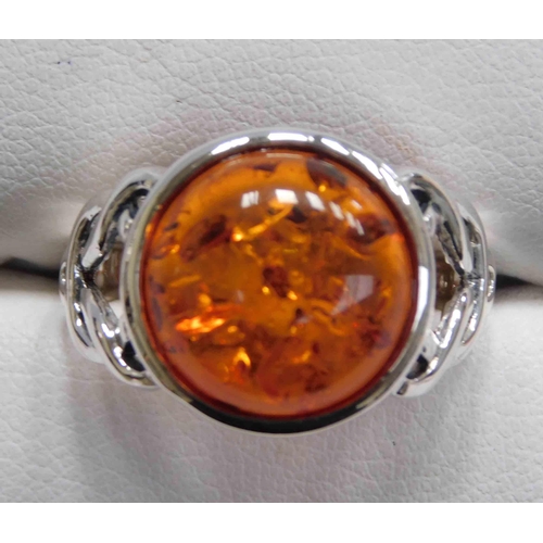 112 - Celtic style - silver & amber ring