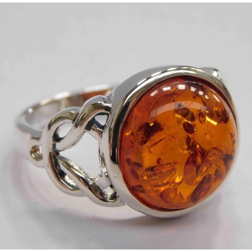 112 - Celtic style - silver & amber ring