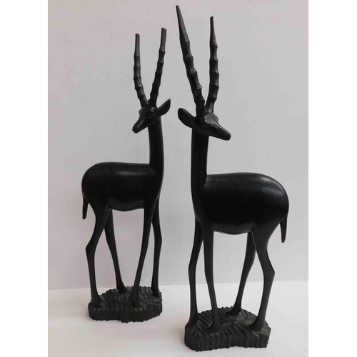 46 - Pair of teak antelopes approx 19