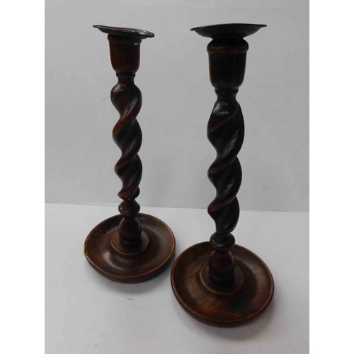 265 - Pair of mahogany - barley twist candlesticks