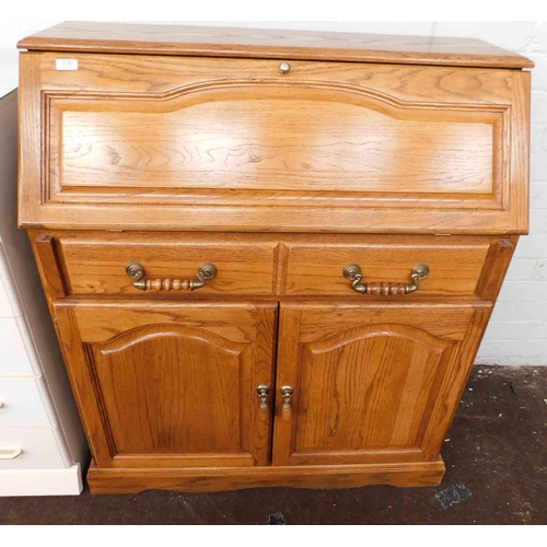 530 - Solid oak bureau with brass handles