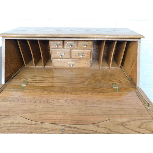 530 - Solid oak bureau with brass handles