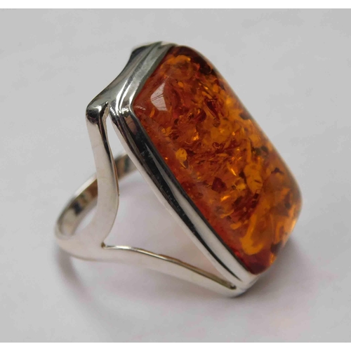 133 - Silver & amber ring