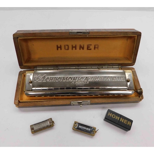 The 64 chromonica Harmonica by M Hohner, & two Little Lady Hohner