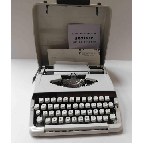 566 - Brother portable typewriter in case