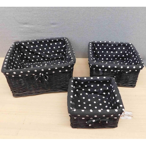 698 - 3x Black wicker baskets with spotted cotton linings - graduated sizes