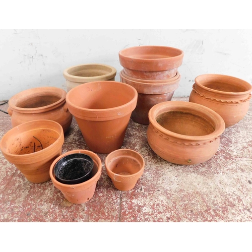 796 - Selection of terracotta plant pots etc.