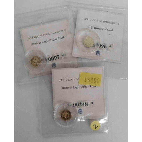 108 - Three - Miniature 14ct gold coins with COAs - US history of gold & two Eagle Dollar