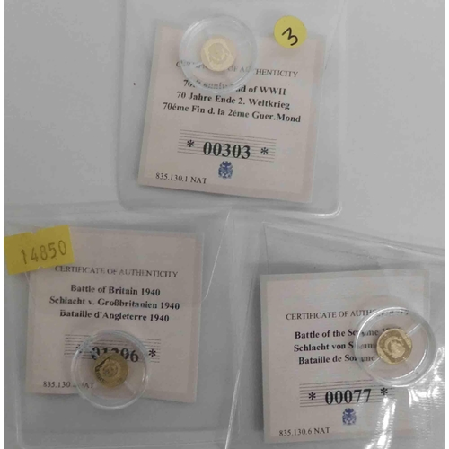 135 - Three - Miniature 14ct gold coins with COAs - Battle of Britannia, Battle of the Somme & WWII