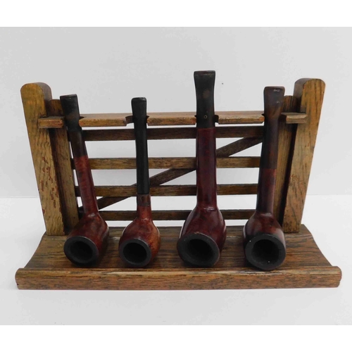 181 - Pipe stand & four pipes