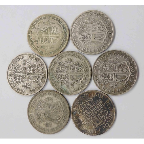 229 - Seven - 1/2 Crown silver coins - dated from 1920 to 1938