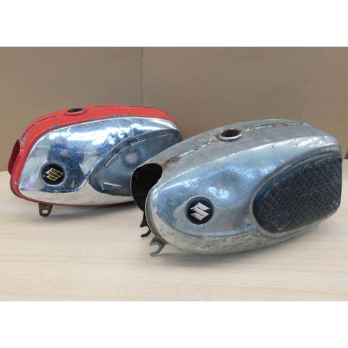 714 - 2x Vintage Suzuki motorbike tanks