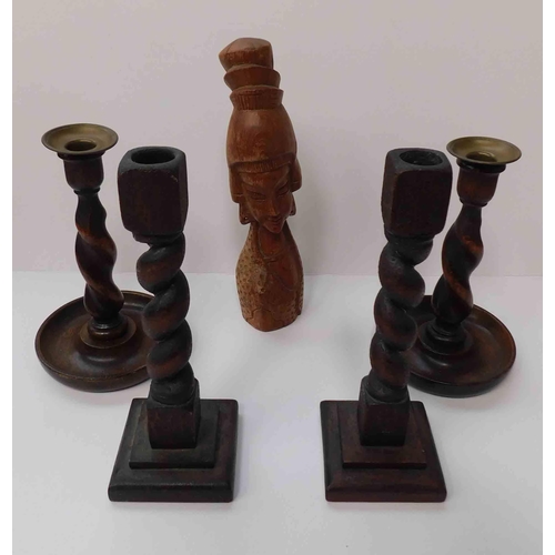 74 - Four - wooden barley twist candlesticks & figure