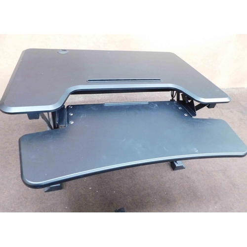 741 - Black hydraulic standing computer desk