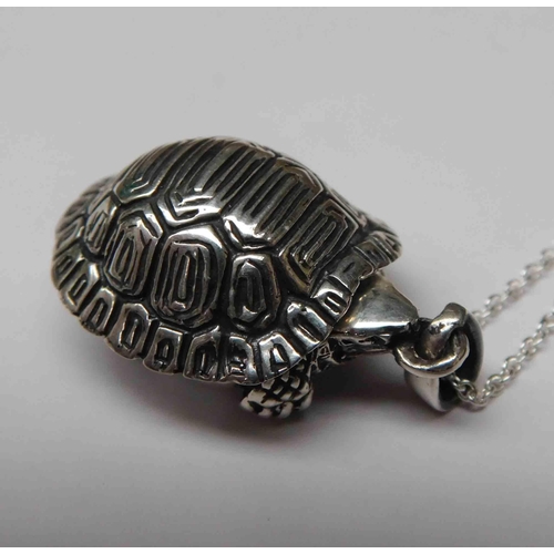 204 - Silver - tortoise locket on silver chain