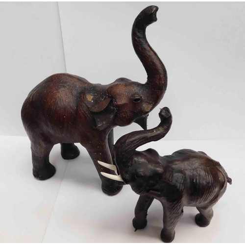 51 - Two - Leather elephants - largest 17