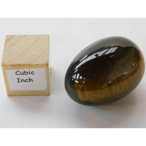 121 - Polished tigers eye egg - approx. 5.5cm x 3.5cm