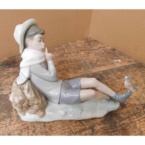 224 - Lladro boy and bird - approx. 8 1/2